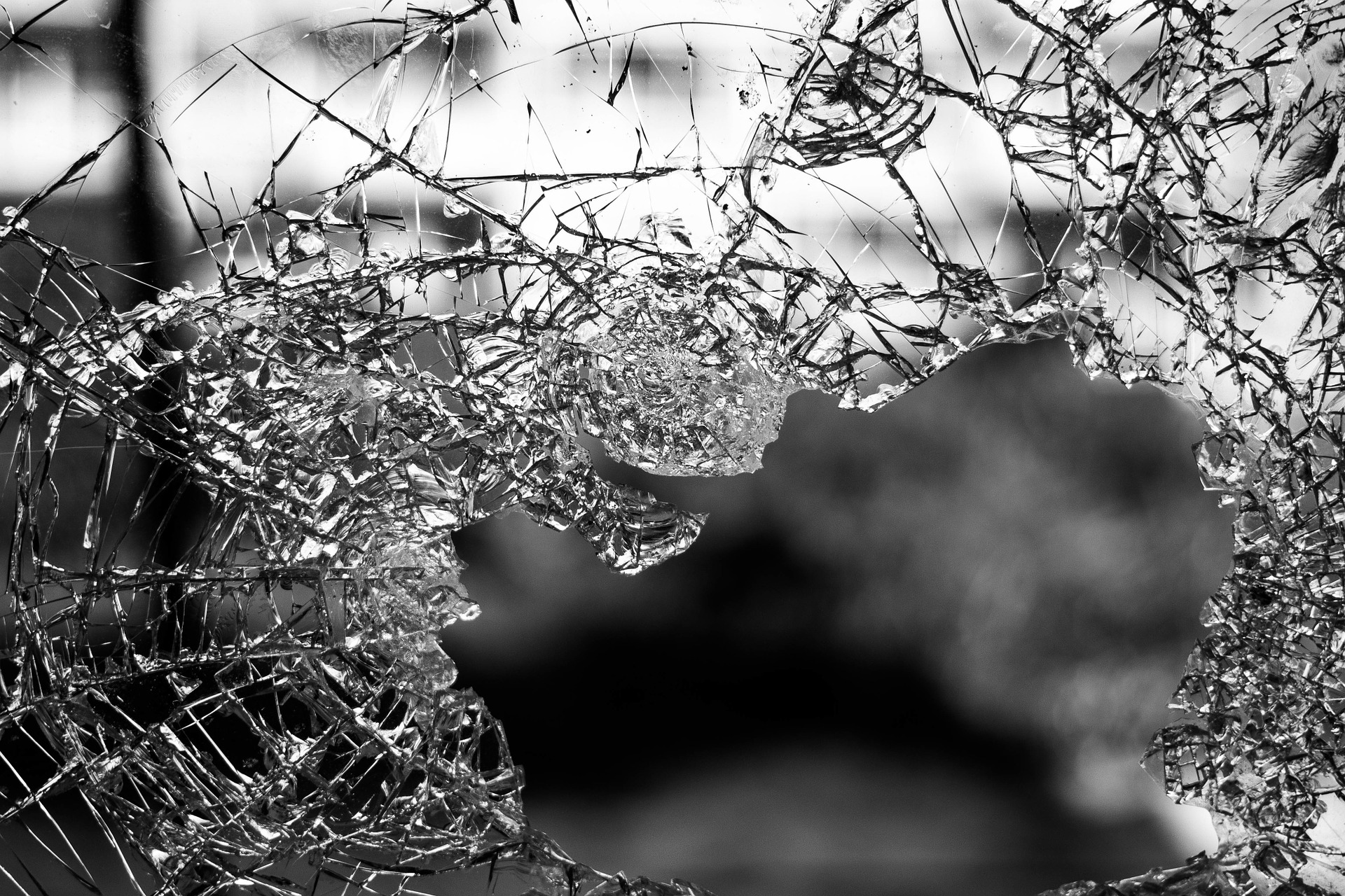 the greatest writing rule of all time: black and white photograph of broken glass